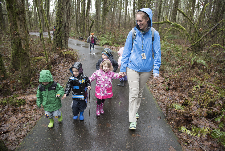 An instructor takes preschoolers on a walk through the Tualatin Hills Nature Park, a dynamic outdoor classroom that offers endless opportunities for discovery.  Find out more at an open house at the Nature Center on Feb. 4.