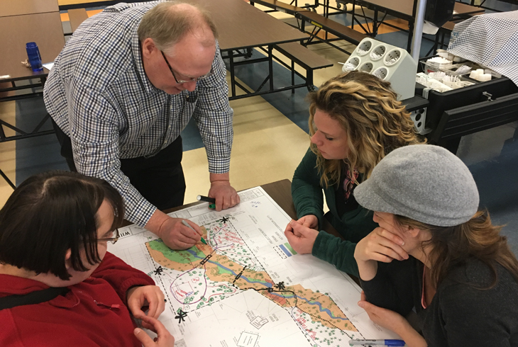 Project manager Steve Gulgren (left) and park neighbors collaborate at a design workshop on Feb. 25. Three recent workshops will help inform THRPD's master plan.