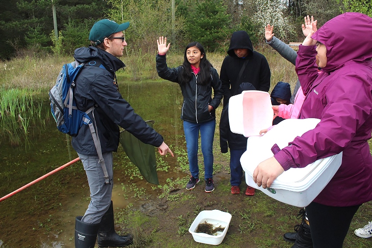 Students from Adelante Mujeres' afterschool Chicas program connect with nature at Tualatin Hills Nature Park.
