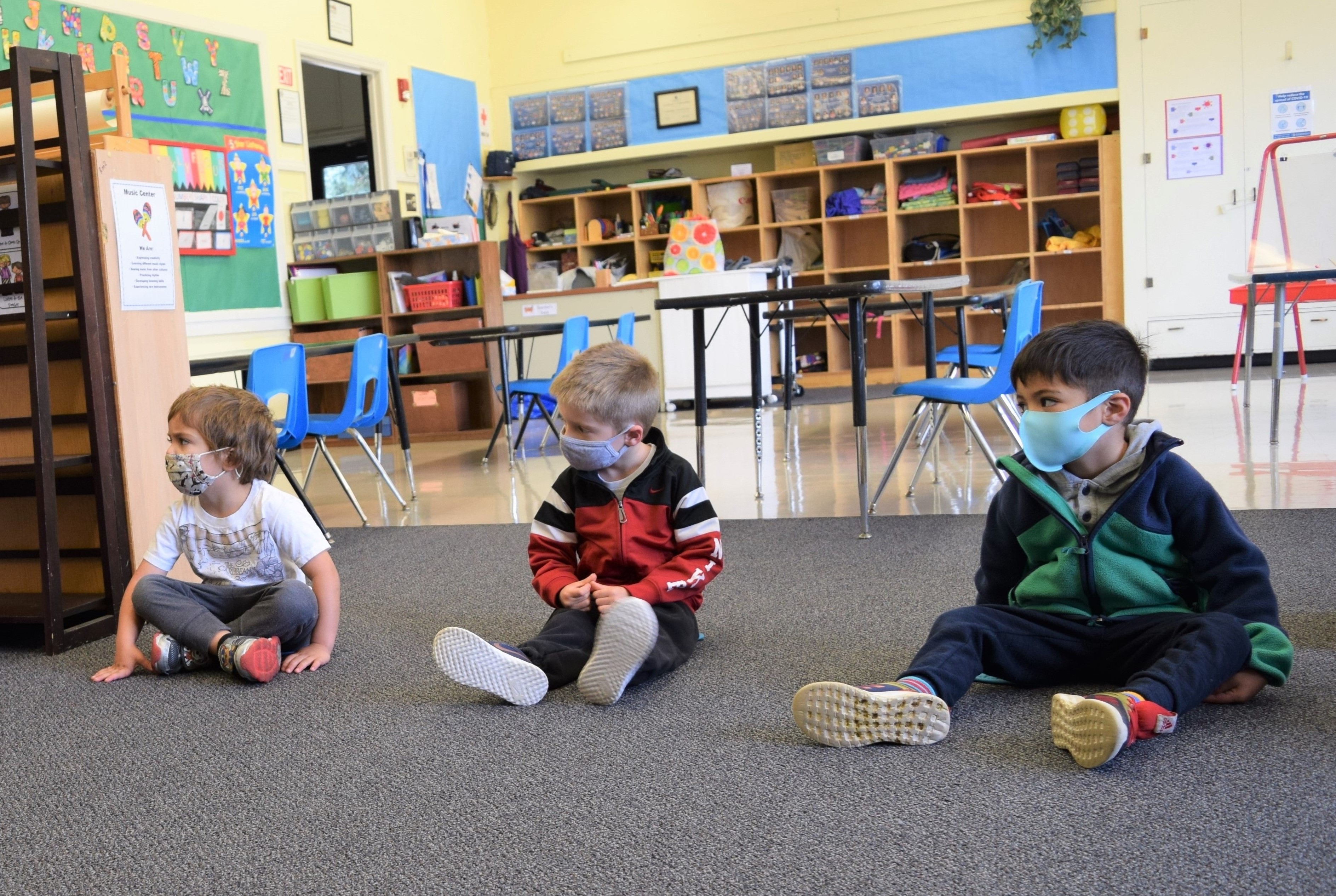 Story time in preschool while physically distancing.