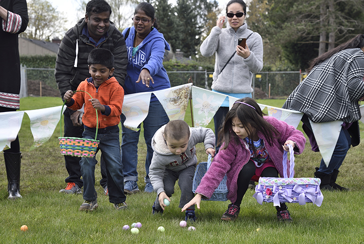 Children dash for eggs and prizes at last year's Spring Egg Hunt at Cedar Hills Recreation Center